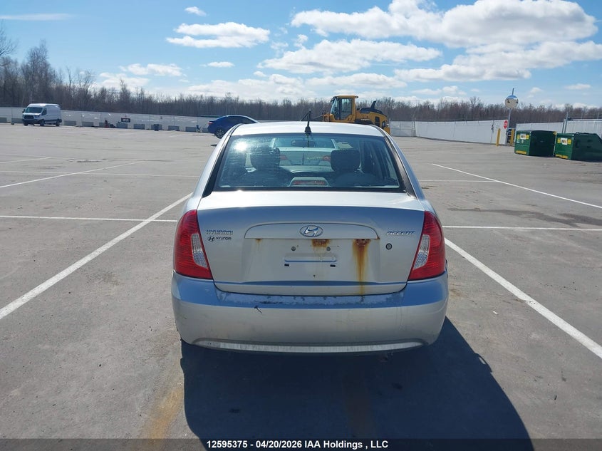 2007 Hyundai Accent Gl/Gls VIN: KMHCN45C67U150413 Lot: 12595375