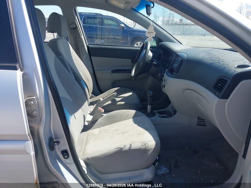 2007 Hyundai Accent Gl/Gls VIN: KMHCN45C67U150413 Lot: 12595375