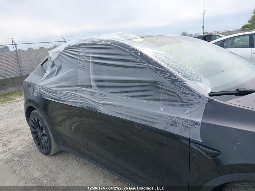 2022 Tesla Model Y VIN: 7SAYGDEE1NF469605 Lot: 12596174