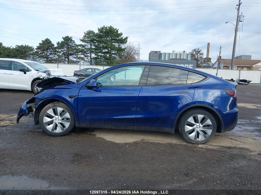 2023 Tesla Model Y Rwd VIN: LRWYGDFD5PC966785 Lot: 12597315