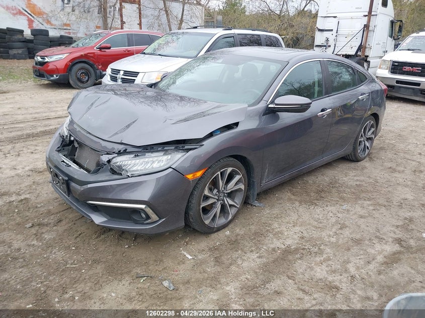 Vin: 2hgfc1f98kh104779, lot: 2999820, honda civic touring 20192