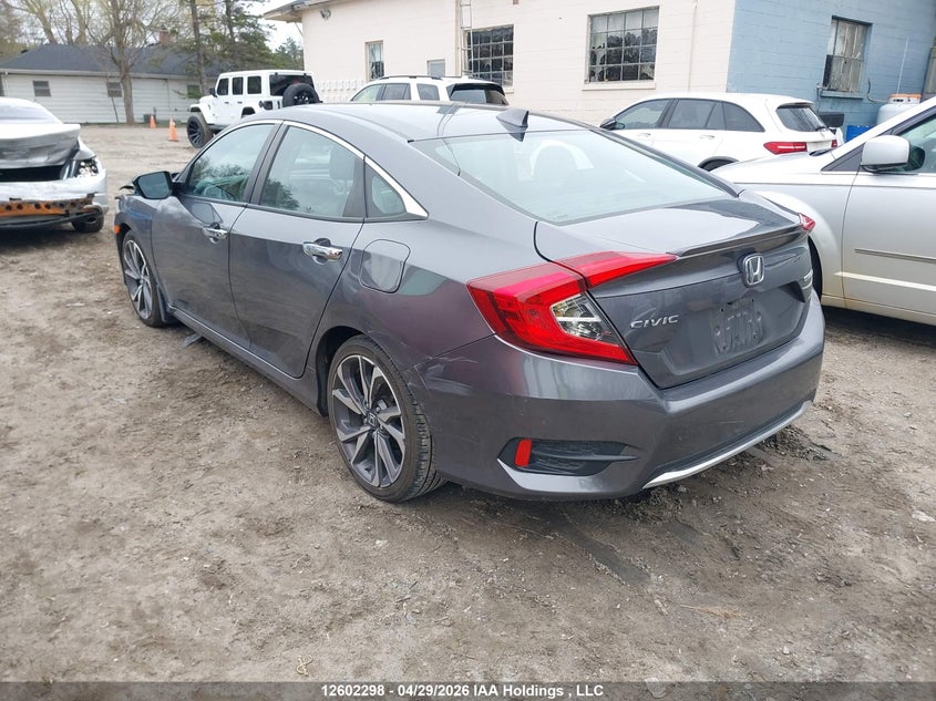 Vin: 2hgfc1f98kh104779, lot: 2999820, honda civic touring 20193