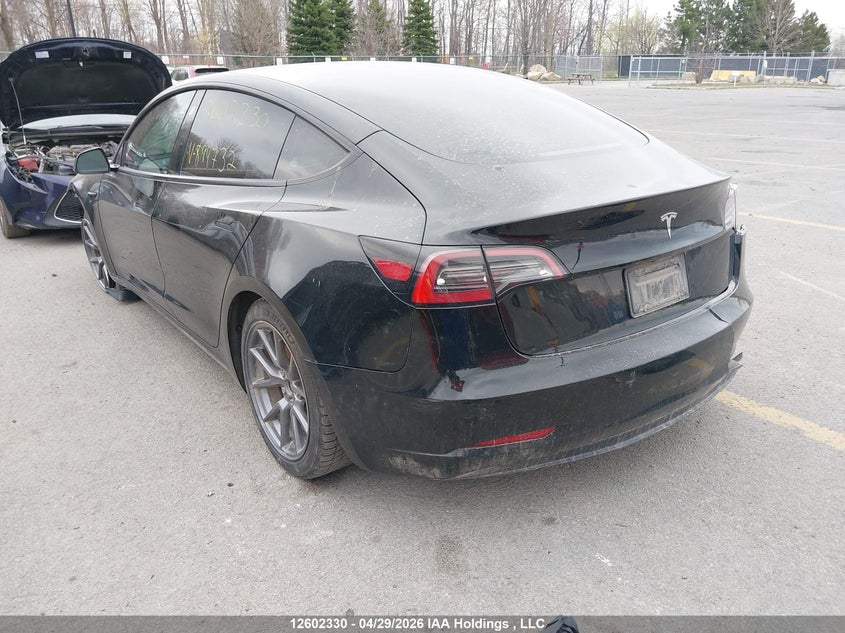 2023 Tesla Model 3 VIN LRW3E1FA4PC899732, IAAI stock 12602330 photo 3