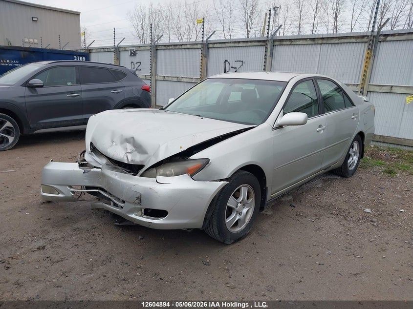 2003 Toyota Camry, Front, IAAI, VIN JTDBE32KX30200429 — photo 2