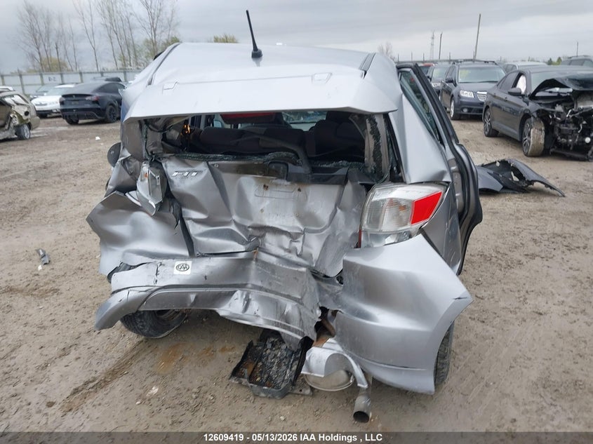 2009 Honda Fit Lx VIN: JHMGE87559S807081 Lot: 12609419