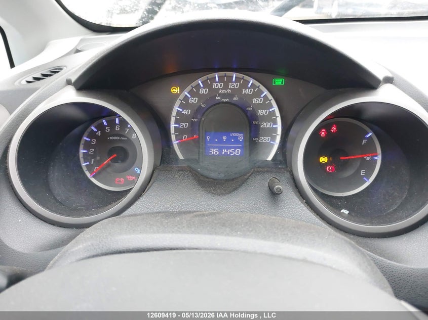 2009 Honda Fit Lx VIN: JHMGE87559S807081 Lot: 12609419