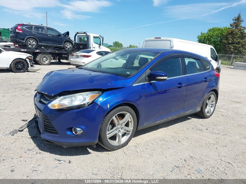 2012 Ford Focus 2.0 blue Lot 111012613069 Vin 1FAHP3M28CL438558