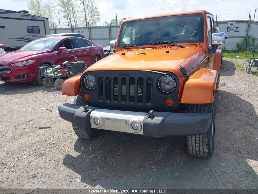 2010 Jeep Wrangler Unlimited Sahara VIN: 1J4BA5H1XAL205674 Lot: 12614110