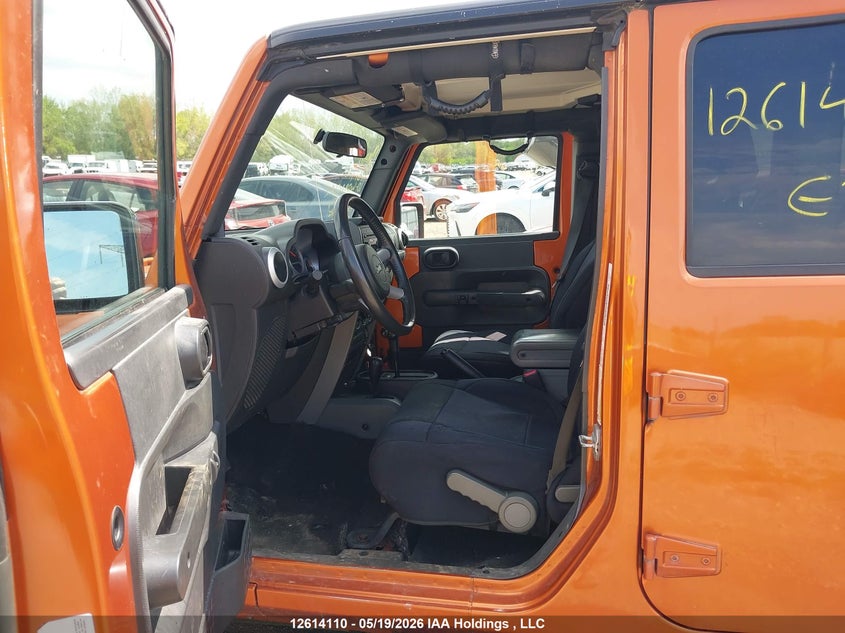 2010 Jeep Wrangler Unlimited Sahara VIN: 1J4BA5H1XAL205674 Lot: 12614110