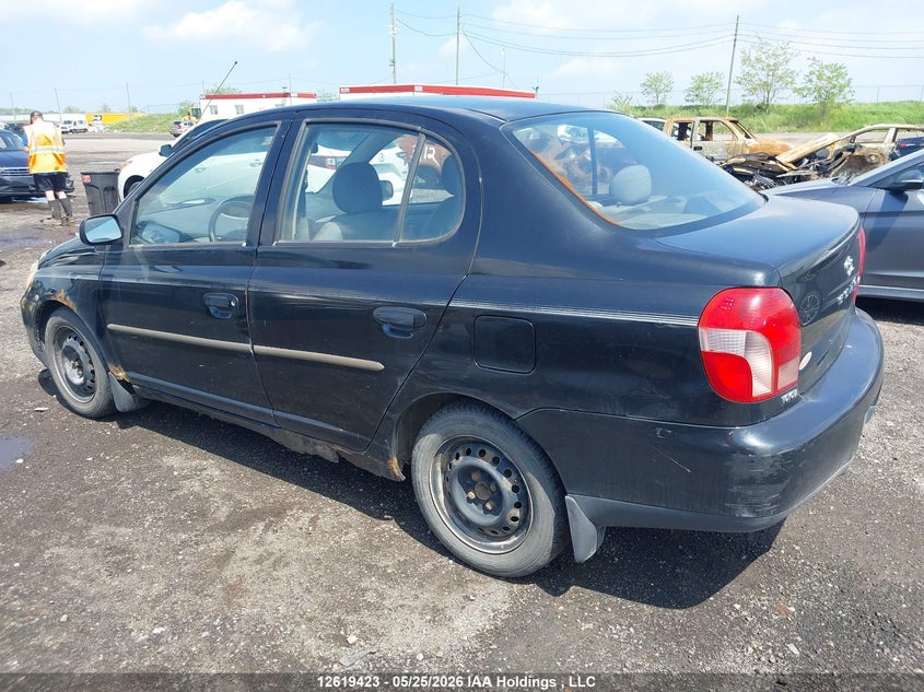 2001 Toyota Echo VIN: JTDBT123510101307 Lot: 12619423