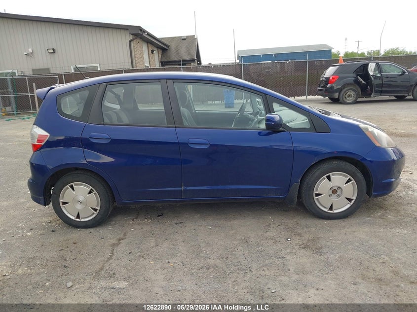 2011 Honda Fit Lx VIN: JHMGE8H55BC801795 Lot: 12622890