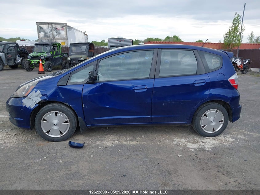 2011 Honda Fit Lx VIN: JHMGE8H55BC801795 Lot: 12622890