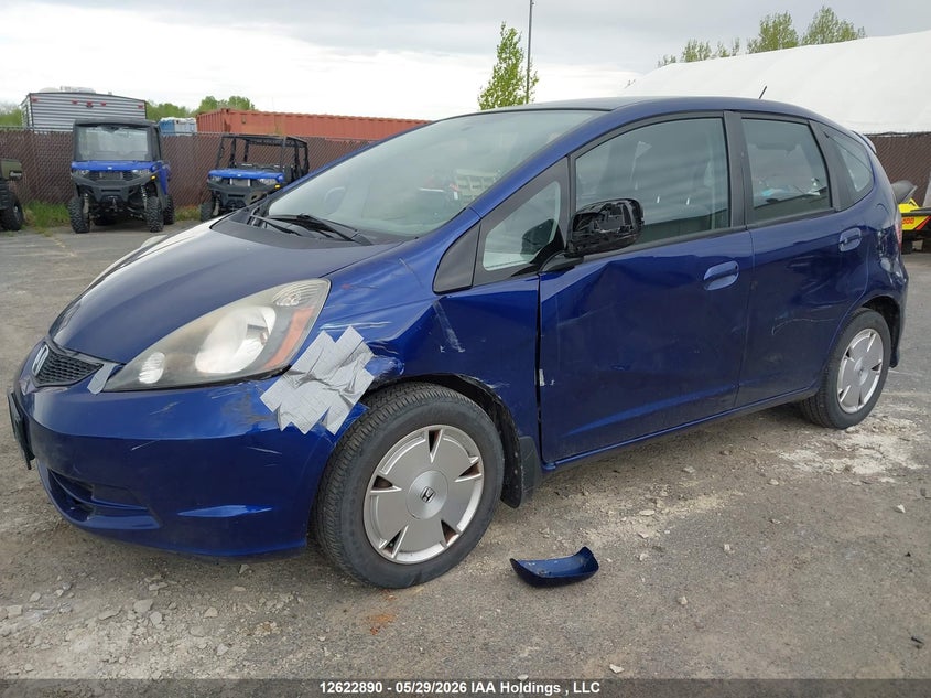 2011 Honda Fit Lx VIN: JHMGE8H55BC801795 Lot: 12622890
