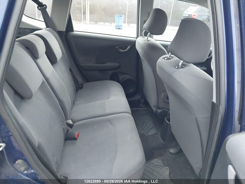 2011 Honda Fit Lx VIN: JHMGE8H55BC801795 Lot: 12622890