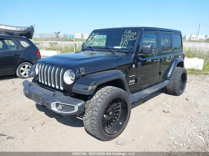 2023 Jeep Wrangler, Theft Recovery, IAAI, VIN 1C4HJXENXPW631875 — photo 2