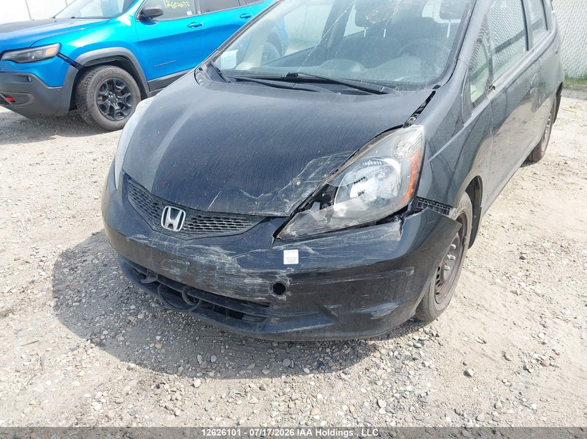 2012 Honda Fit Lx VIN: LUCGE8H59C3000625 Lot: 12626101