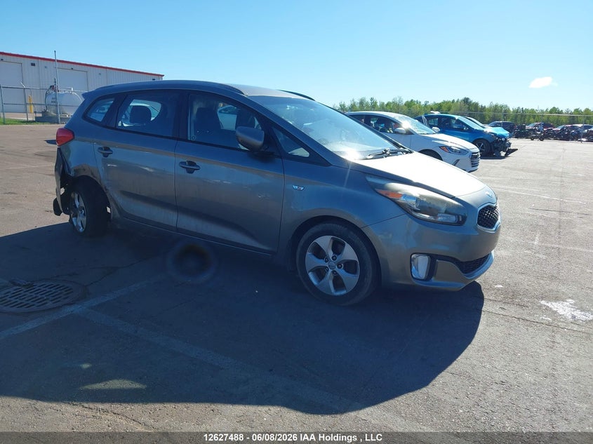 KNAHT8A30E7057103 KIA RONDO Photo 1