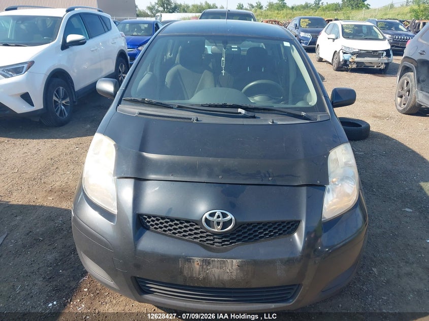 2009 Toyota Yaris VIN: JTDKT923395263398 Lot: 12628427