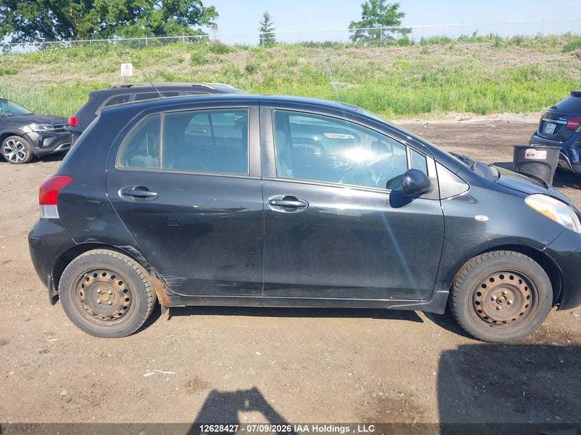 2009 Toyota Yaris VIN: JTDKT923395263398 Lot: 12628427