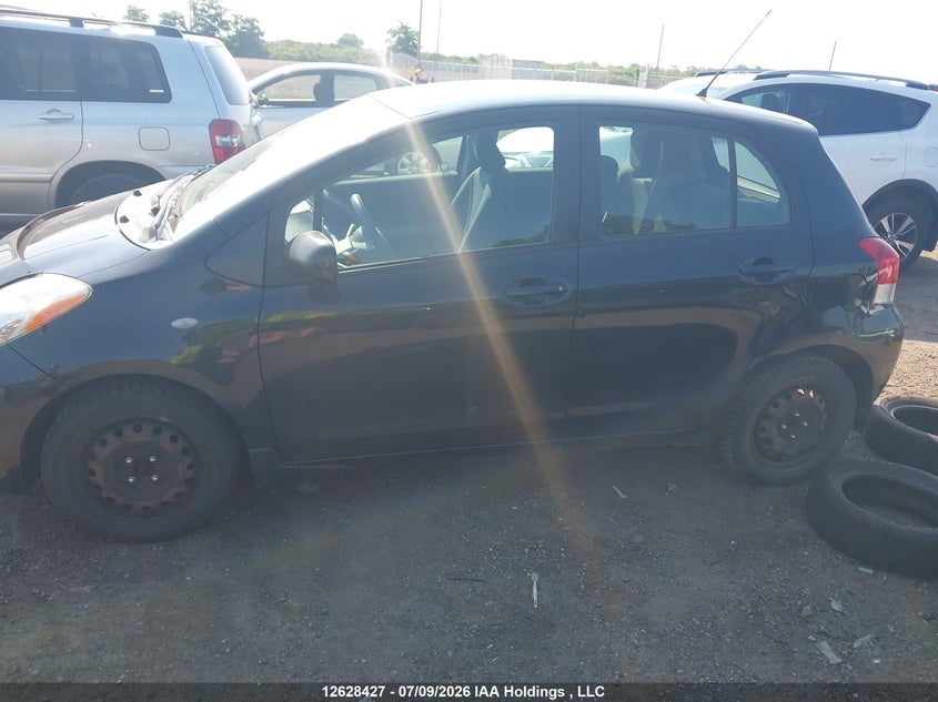 2009 Toyota Yaris VIN: JTDKT923395263398 Lot: 12628427