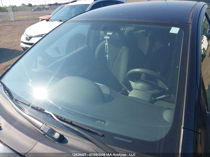 2009 Toyota Yaris VIN: JTDKT923395263398 Lot: 12628427