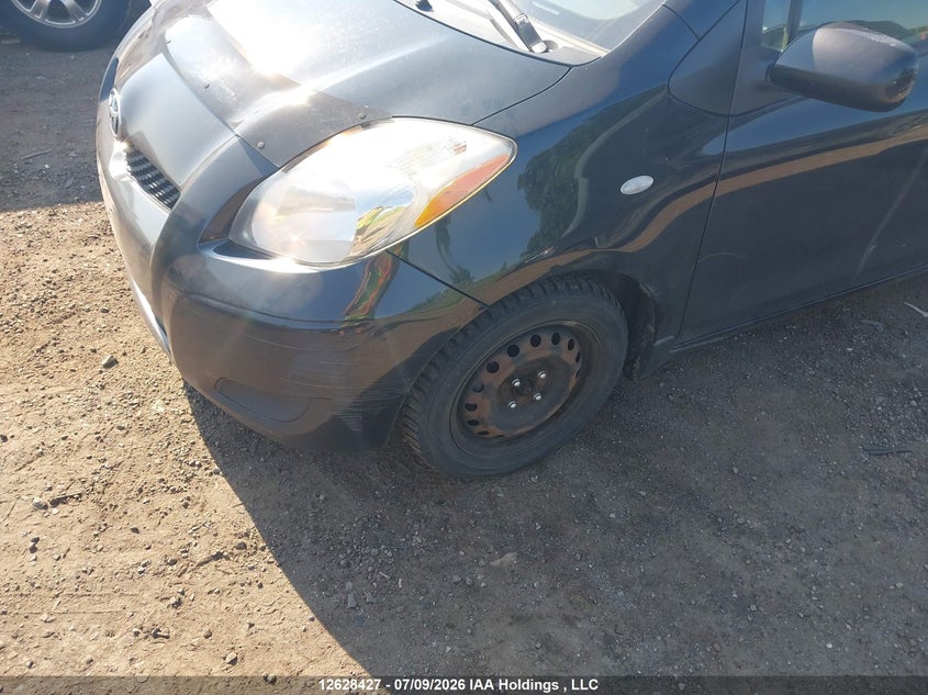 2009 Toyota Yaris VIN: JTDKT923395263398 Lot: 12628427