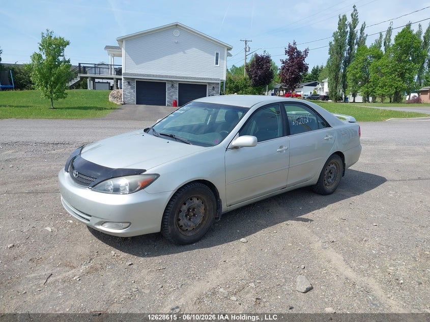 2003 Toyota Camry, Rear, IAAI, VIN JTDBE32K430188200 — photo 2