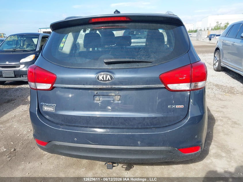 2014 Kia Rondo VIN: KNAHU8A3XE7017219 Lot: 12629611