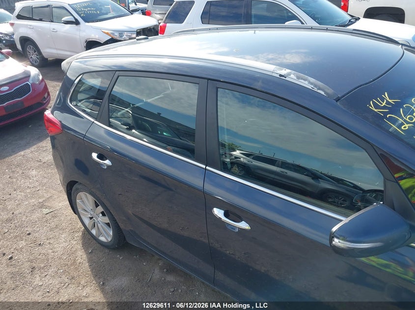 2014 Kia Rondo VIN: KNAHU8A3XE7017219 Lot: 12629611