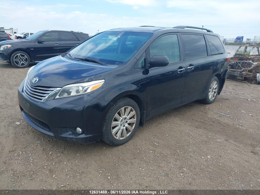 2015 Toyota Sienna, Rear, IAAI, VIN 5TDDK3DC0FS127063 — photo 2