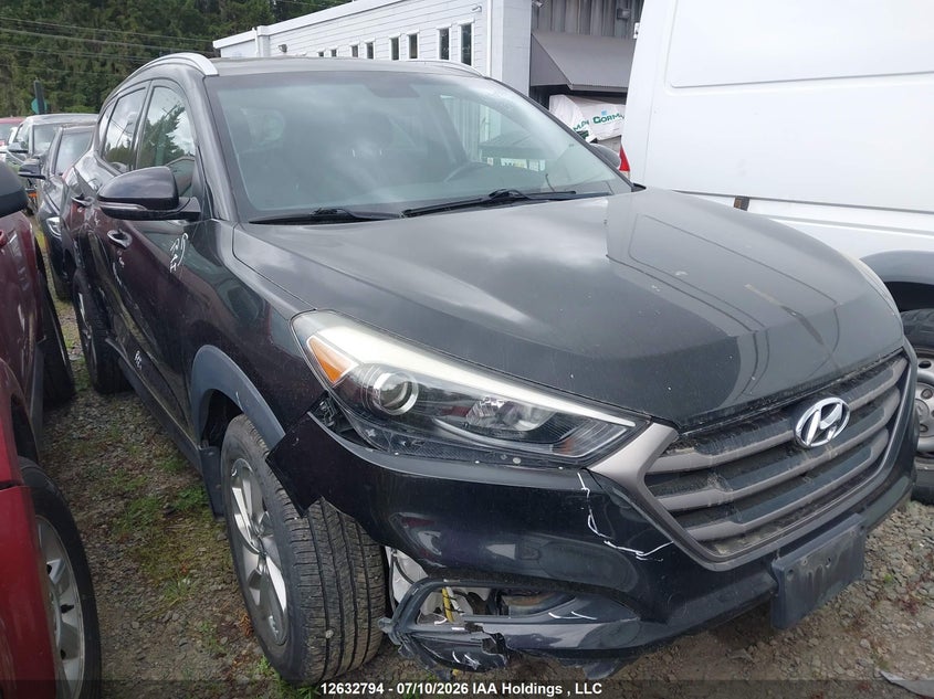 KM8J33A44GU219055 HYUNDAI TUCSON Photo 1