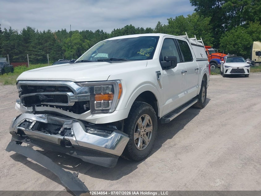 2023 Ford F-150 Xlt, Front, IAAI, VIN 1FTFW1E81PFC60511 — photo 2