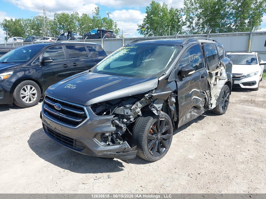 2017 Ford Escape Titanium, Left Side, IAAI, VIN 1FMCU9J99HUD87909 — photo 2