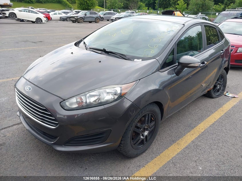 2015 Ford Fiesta, Left Rear, IAAI, VIN 3FADP4BE2FM137028 — photo 2