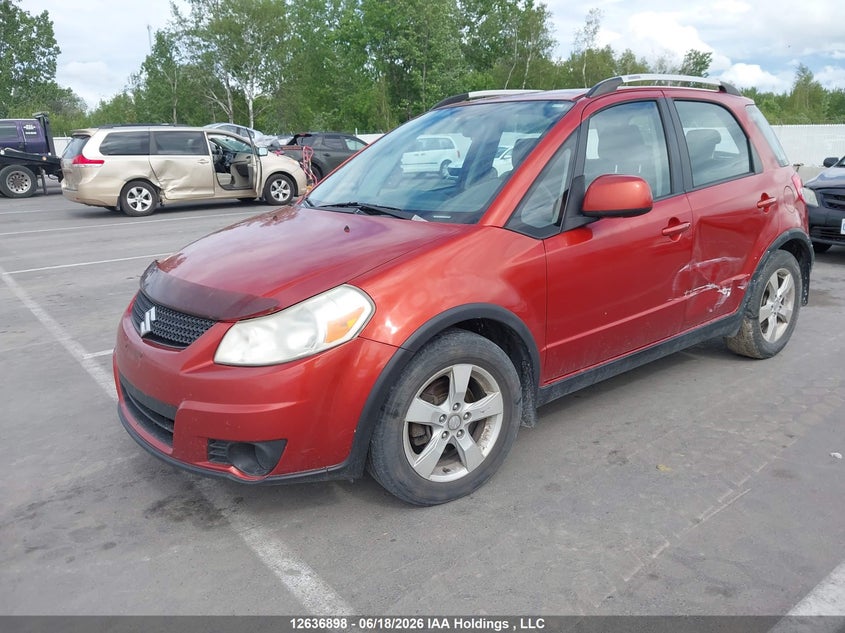 2010 Suzuki SX4, Левый бок, IAAI, VIN JS2YB5A72A6300813 — фото 2
