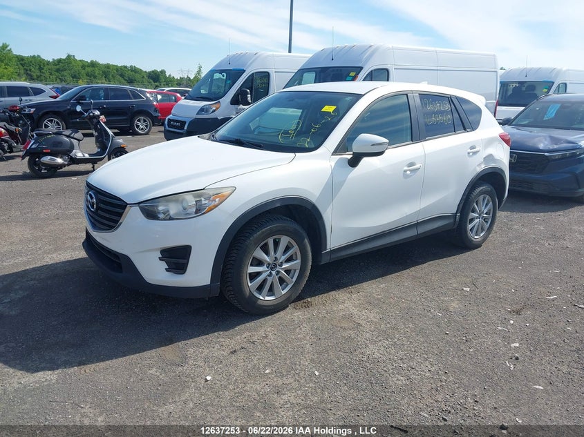 2016 Mazda CX-5, Левый бок, IAAI, VIN JM3KE2BY7G0835619 — фото 2