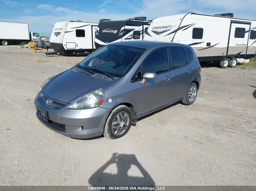 2007 Honda Fit, Left Side, IAAI, VIN JHMGD38467S812413 — photo 2