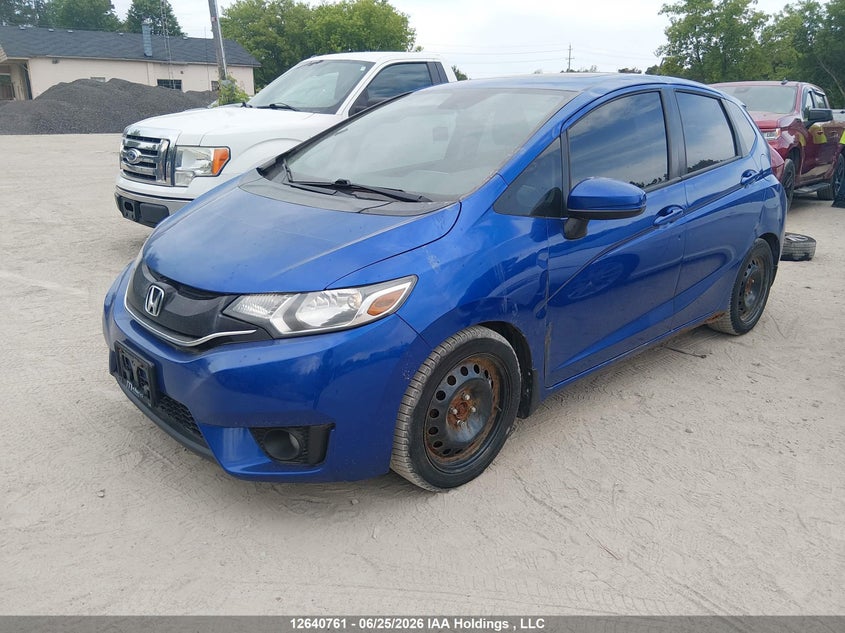 2015 Honda Fit, Charity, IAAI, VIN 3HGGK5H87FM104914 — photo 2