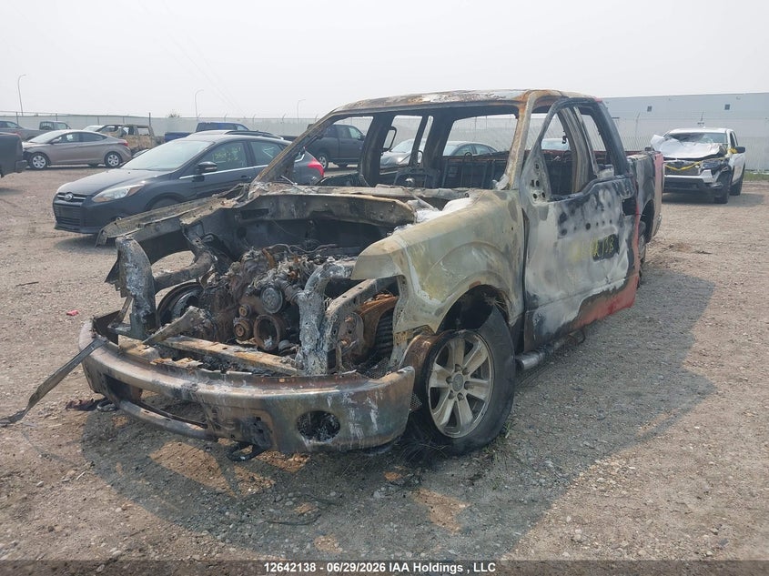 2011 Ford F-150, Theft Recovery, IAAI, VIN 1FTFW1EF0BFA80105 — photo 2