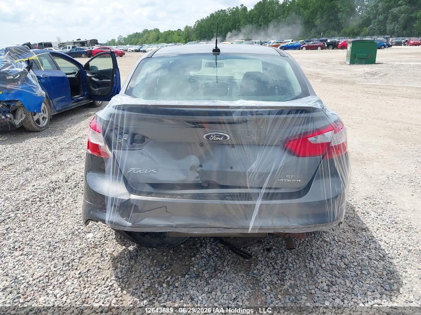 2014 Ford Focus Se VIN: 1FADP3F27EL335338 Lot: 12643689