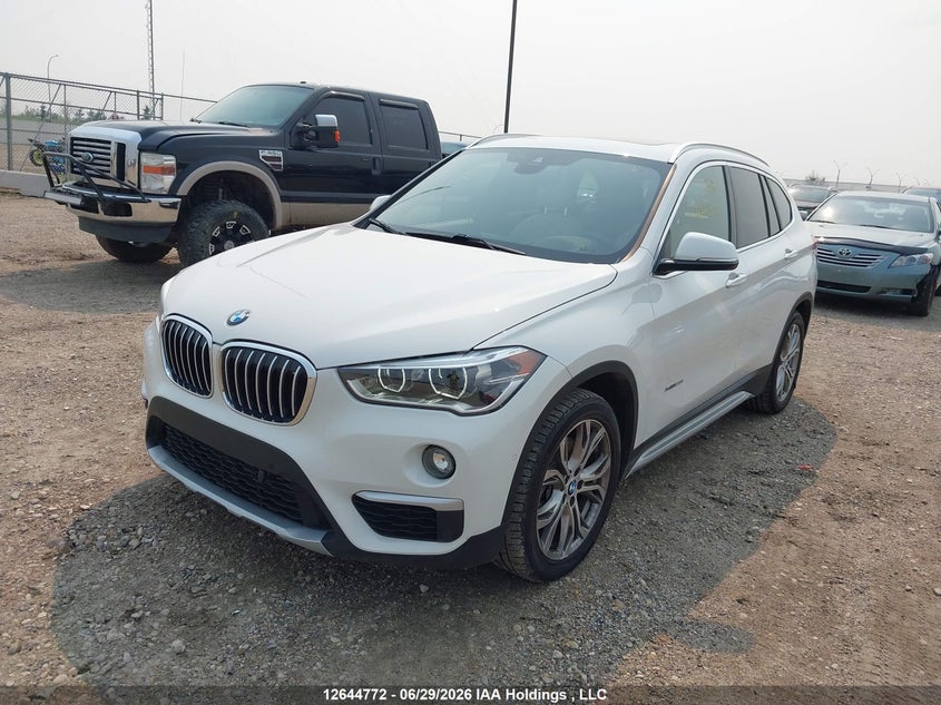 2016 BMW X1, Удар сзади, IAAI, VIN WBXHT3C35G5E54622 — фото 2
