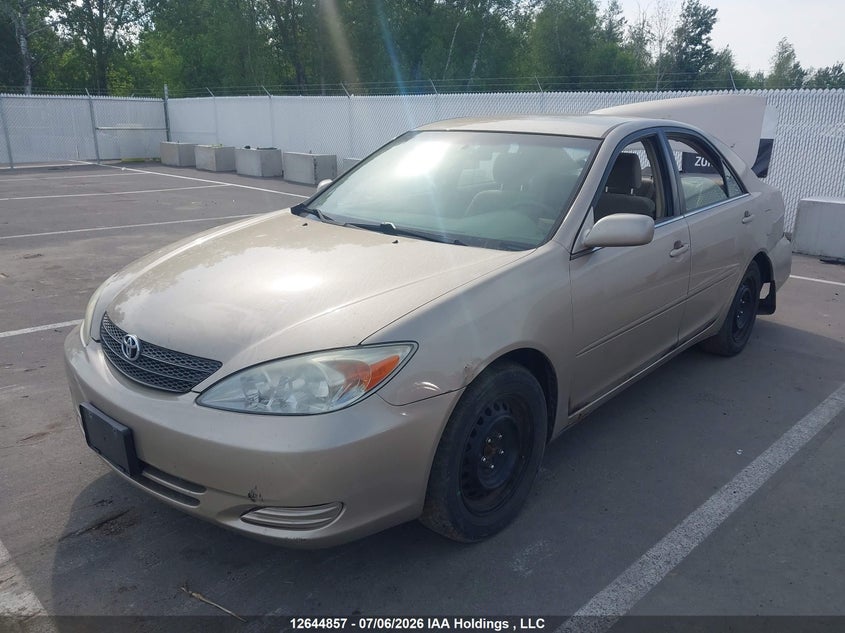 2003 Toyota Camry, Rear, IAAI, VIN JTDBE32K730153649 — photo 2