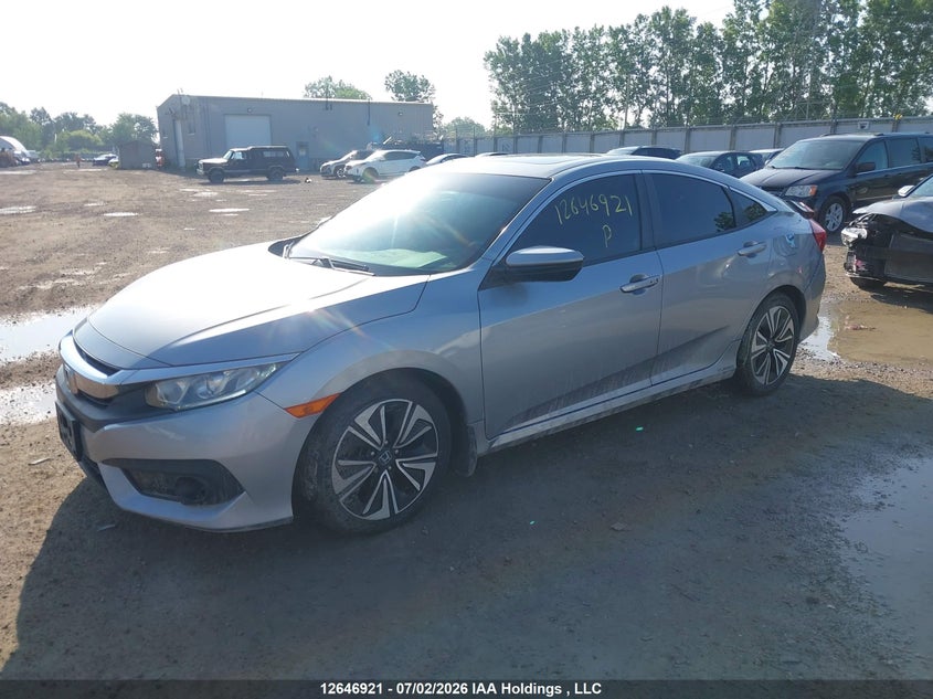 2016 Honda Civic, Rear, IAAI, VIN 2HGFC1F43GH106984 — photo 2