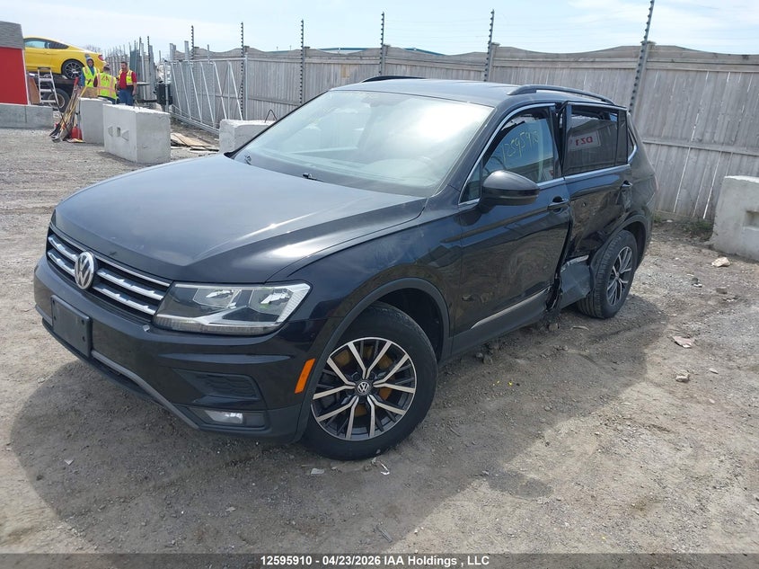 2021 Volkswagen Tiguan Comfortline/United, Левый бок, IAAI, VIN 3VV2B7AX8MM141345 — фото 2