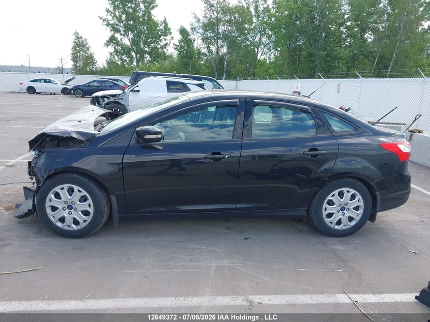 2014 Ford Focus VIN: 1FADP3F2XEL335057 Lot: 12649372