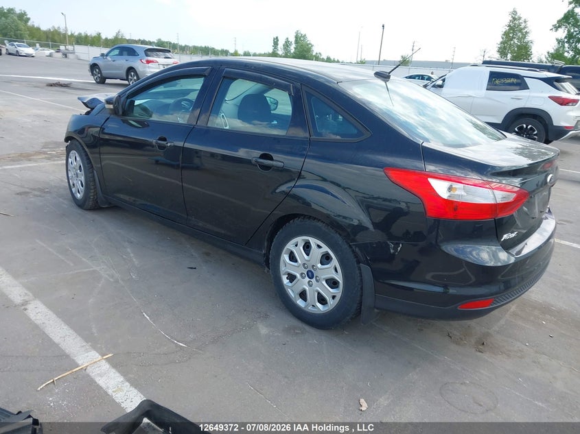2014 Ford Focus VIN: 1FADP3F2XEL335057 Lot: 12649372