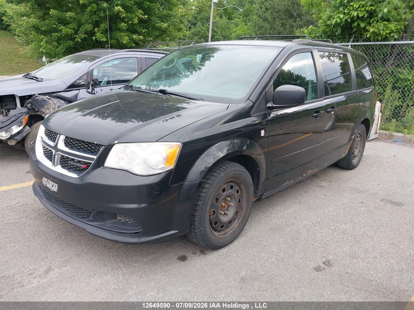 2014 Dodge Caravan, Благотворительность, IAAI, VIN 2C4RDGBGXER336945 — фото 2