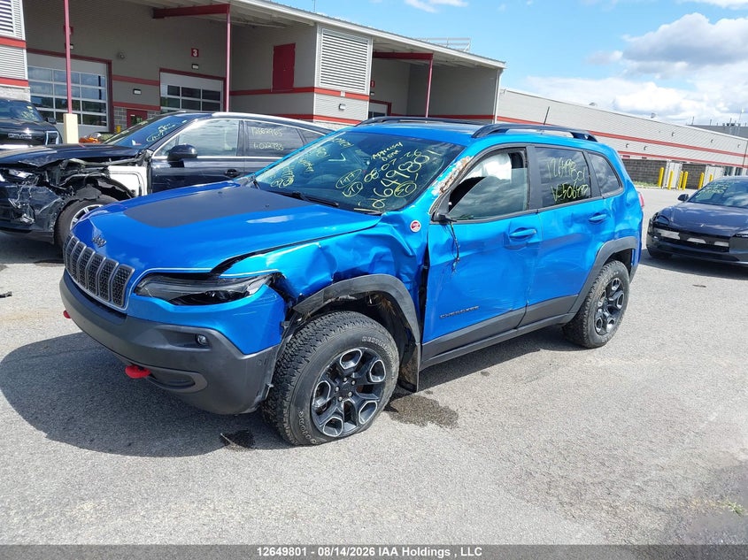 2022 Jeep Cherokee, Left Side, IAAI, VIN 1C4PJMBX3ND506497 — photo 2
