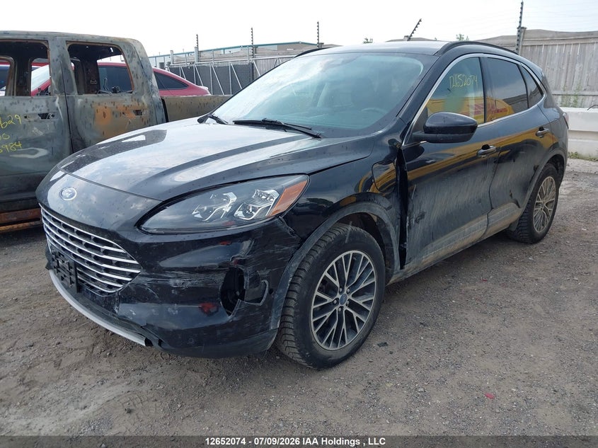 2022 Ford Escape Phev Titanium, Left Front, IAAI, VIN 1FMCU0LZ1NUA51949 — photo 2