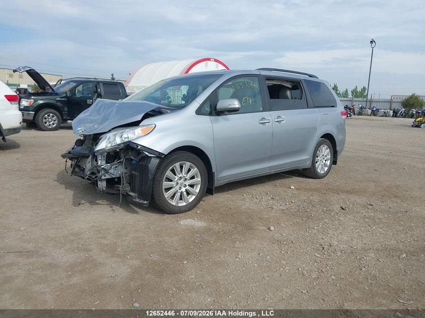 2014 Toyota Sienna, Front, IAAI, VIN 5TDDK3DC5ES087349 — photo 2